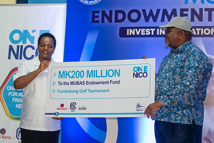 Hon. Msaka SC (R) and Assoc. Prof. Chitera hold a symbolic cheque from One Nico, platinum sponsors of MUBAS Endowment Fund Golf Tournament