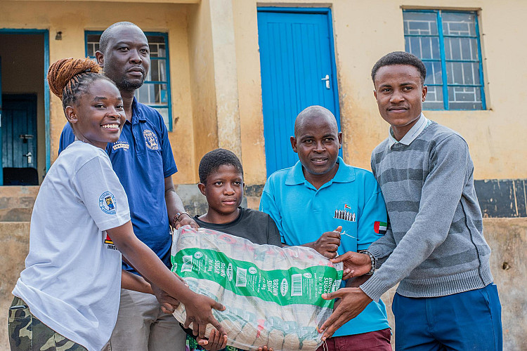 Head of Civil Engineering, Associate Professor handing out the donation to BAHASI officials