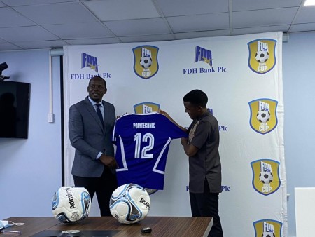 Football team shot in the arm