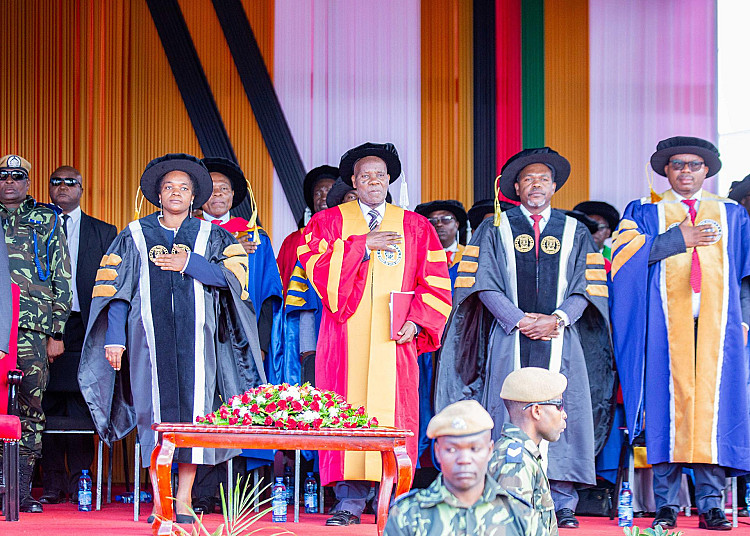 Left to Right: The VC, DVC and the Registrar singing the national anthem