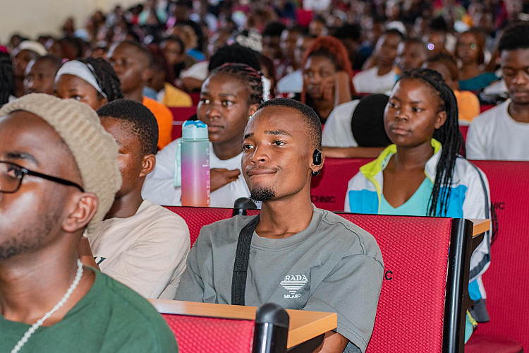 Students listening to presentations
