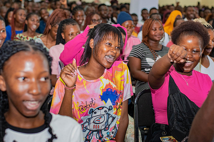 Fists raised as students shout the “MUBAS HUWA” slogan