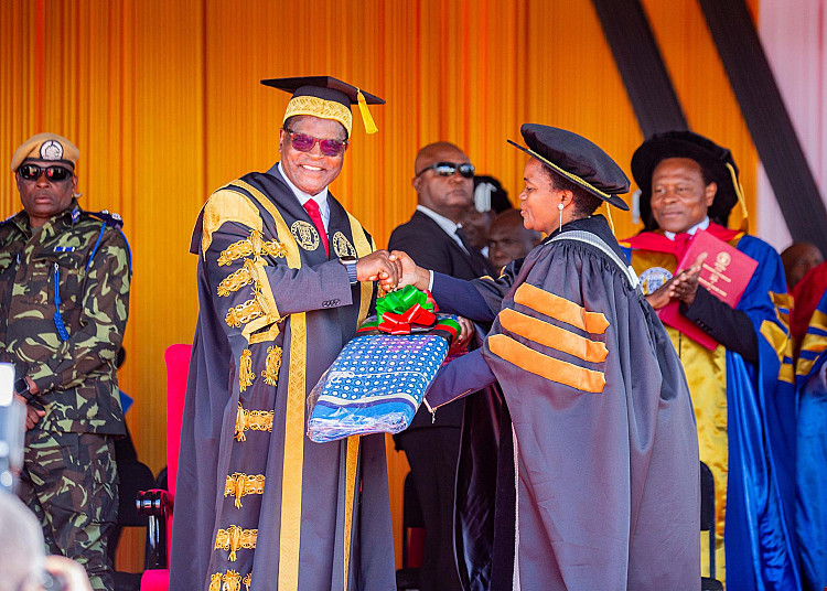 The VC giving the Chancellor the MUBAS wrapper