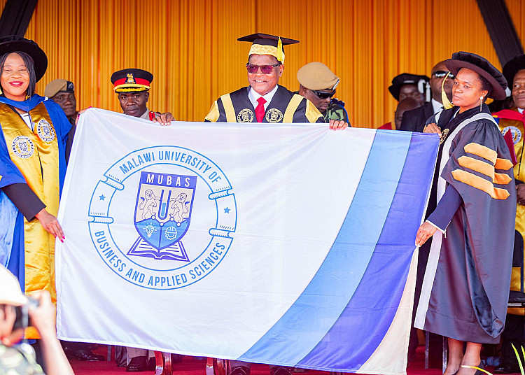 The MUBAS flag being presented