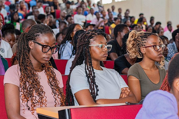 Students listening to presentations