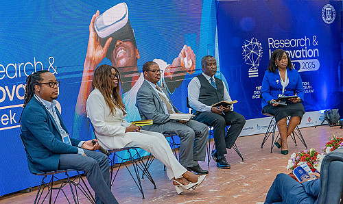 Discussion panel interacting with participants on research and innovation issues